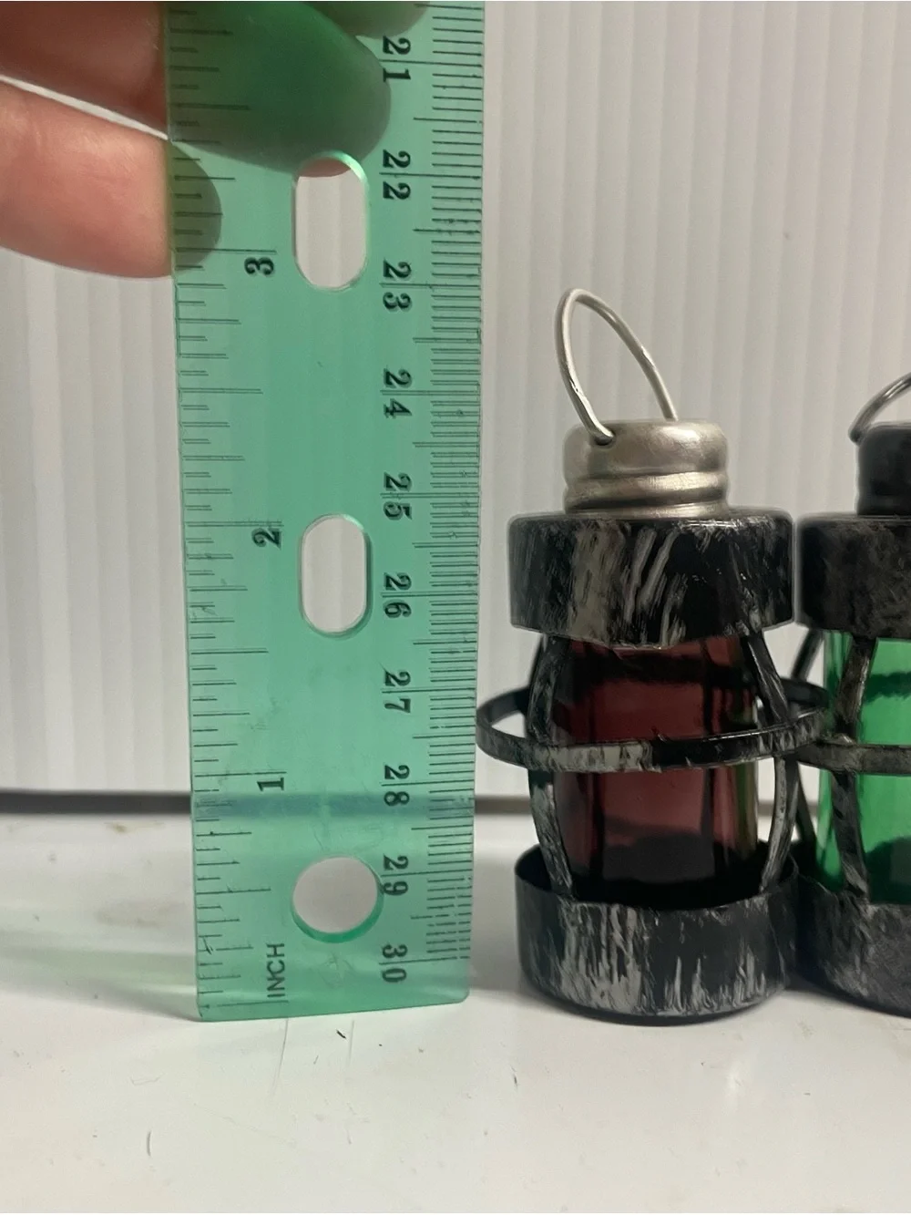 2 sets of salt and pepper shakers look like lanterns